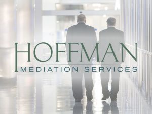 Hoffman Logo with Two Men Walking and Talking